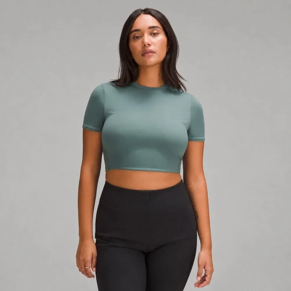 Lululemon Wundermost Ultra-Soft Nulu Cropped in Medium Forest Size Medium